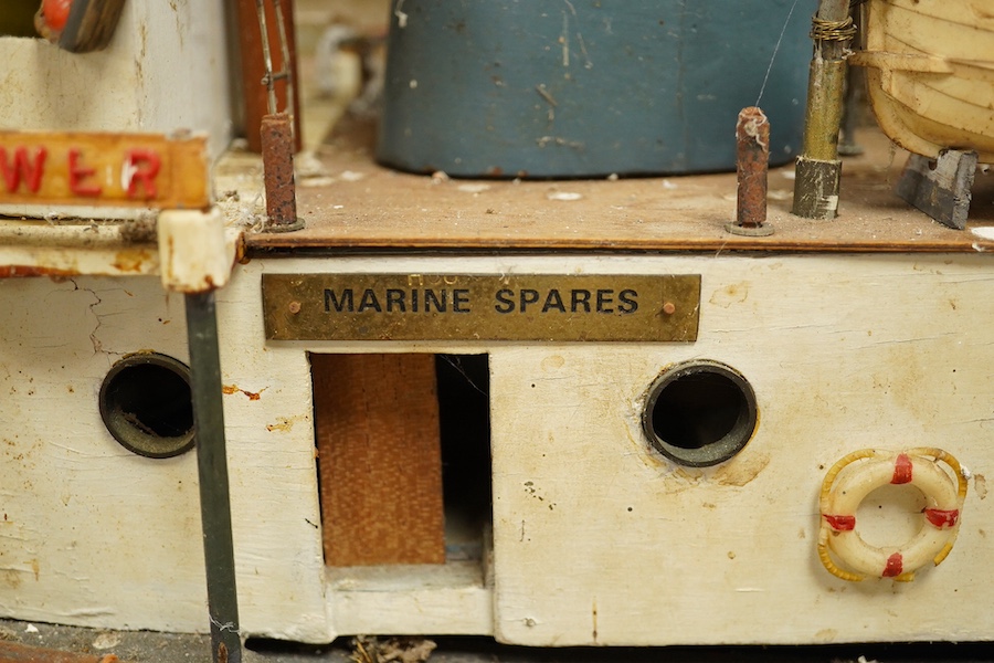 A scale model of a tug boat ‘T.I.D 4’, a well detailed model with the remains of internal wiring and electric motor for use as a pond yacht, length of hull approx 92cm. Condition - poor to fair, now in need of some resto